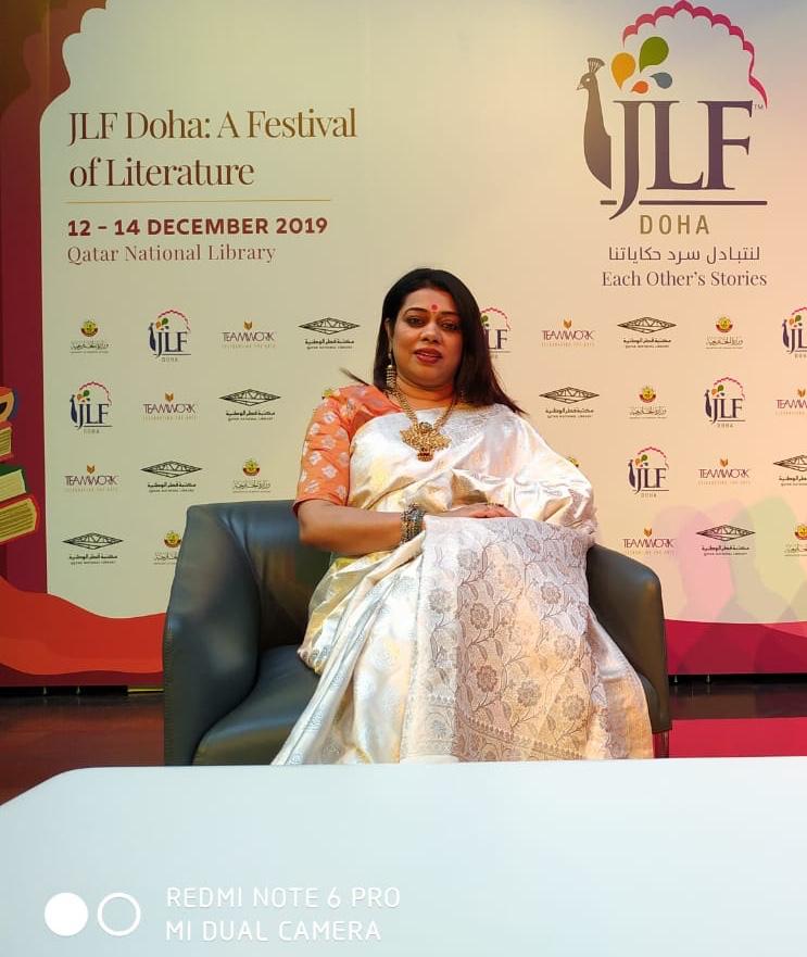 Barnali Chattopadhyay at an international literature festival backdrop